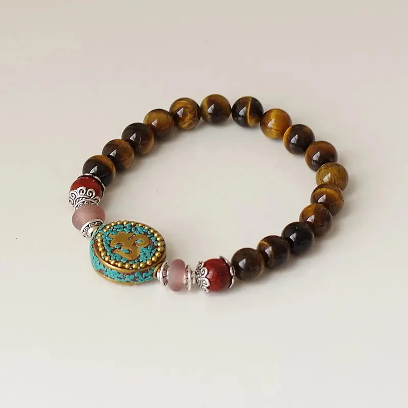 Détails du Bracelet Tibétain Om Et Oeil de Tigre