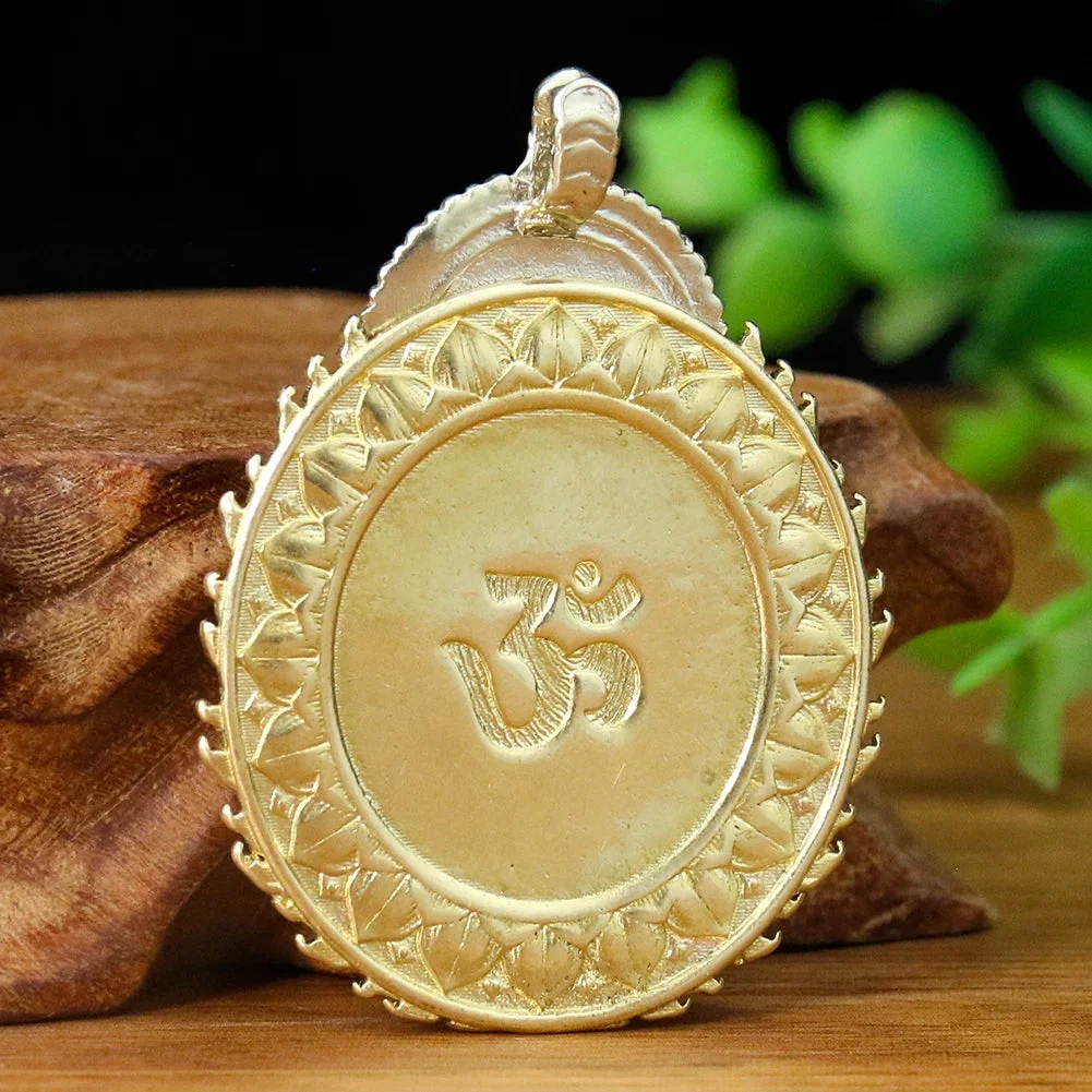 Amulette Bouddhiste Ganesh en Cuivre sur un fond zen