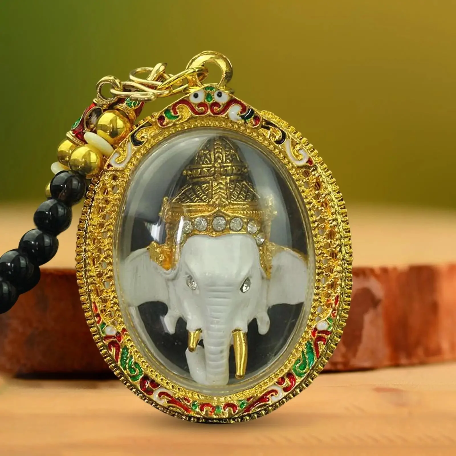 Amulette Ganesh Or portée