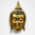 Statue de tête de Bouddha dorée