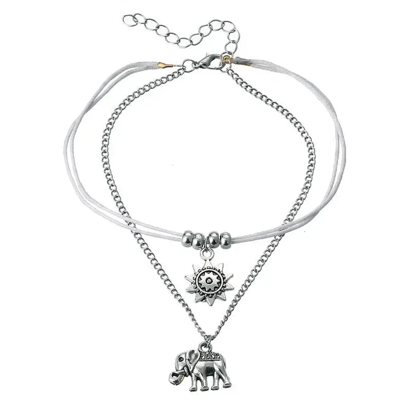 Détail du bracelet de cheville éléphant d'Asie