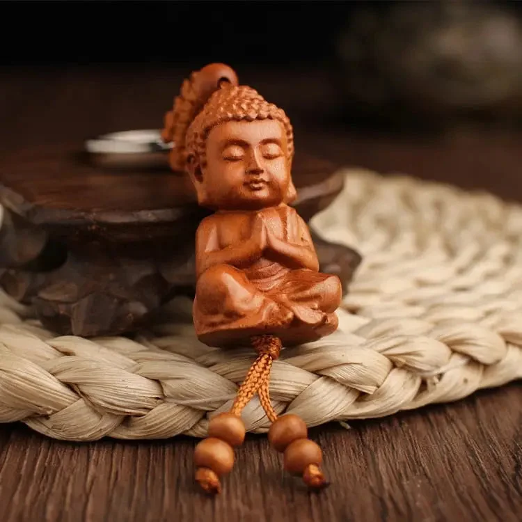 Porte-clés Bouddha en bois de pêche